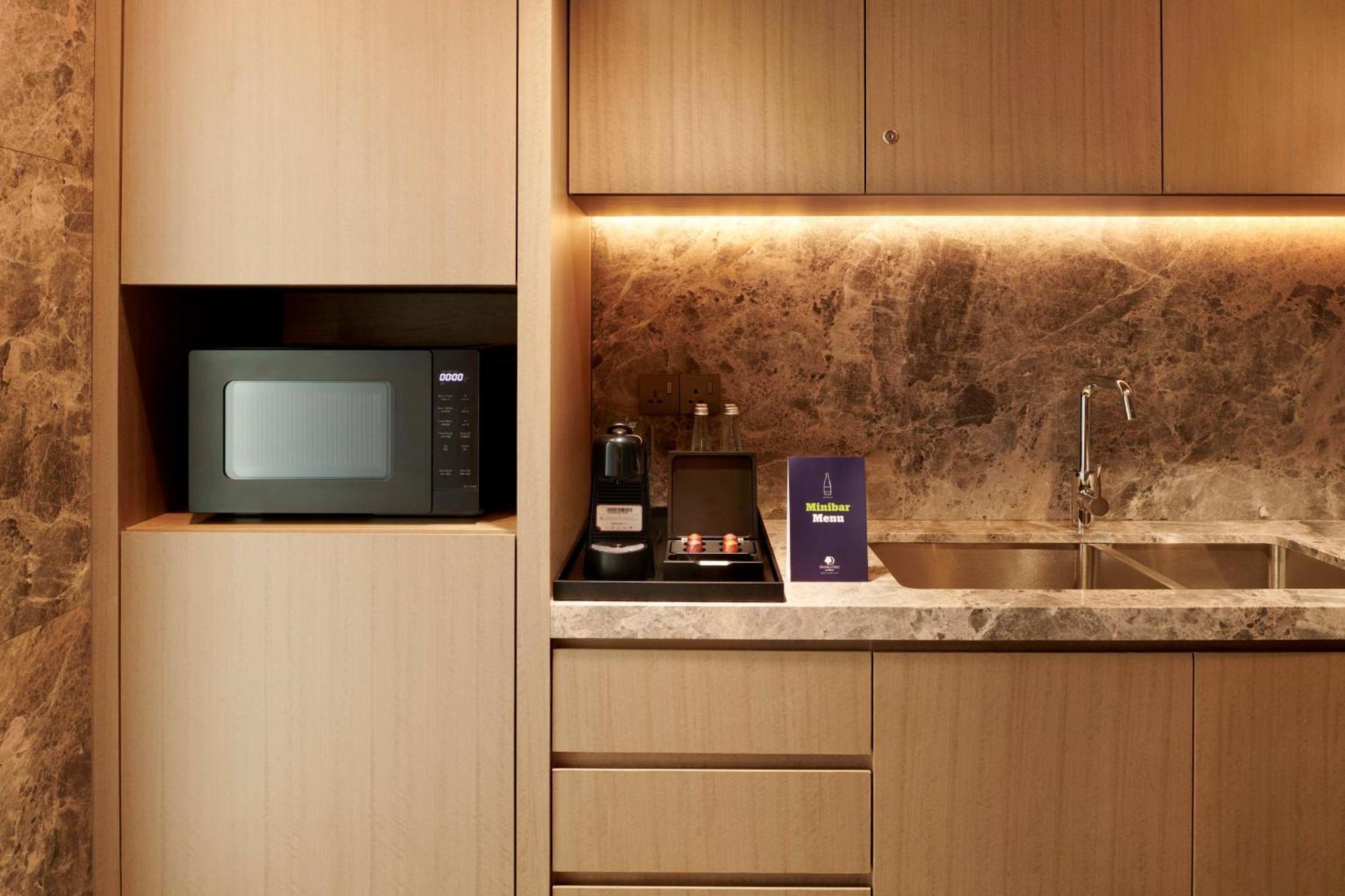Doubletree By Hilton Shah Alam I-City Exterior foto A microwave oven in a kitchen